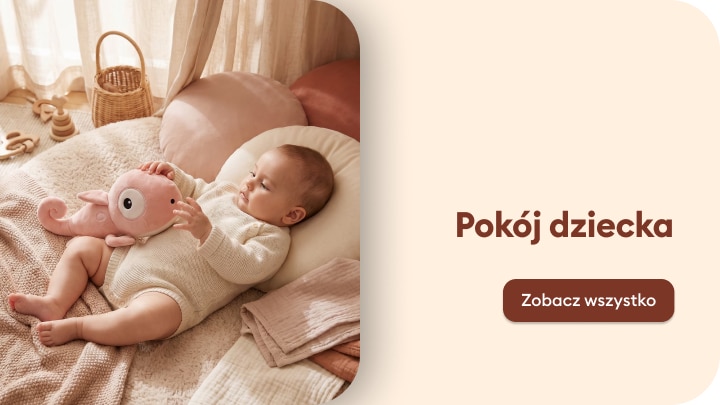 Inspiracja do aranżacji pokoju dziecka i wyboru akcesoriów: niemowlę odpoczywa w przytulnym wnętrzu z zabawką.