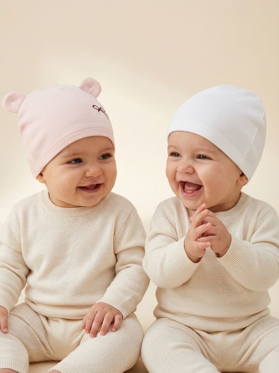Bawełniane czapki niemowlęce 2 pack - biały - SINSAY