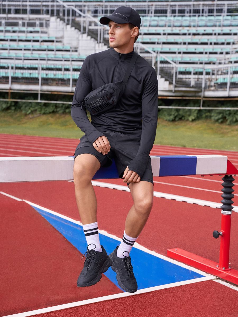 Dvouvrstvé sportovní šortky SNSY PERFORMANCE Dvouvrstvé sportovní šortky SNSY PERFORMANCE - černá - SINSAY