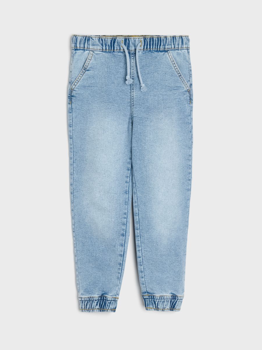 Jeansy jogger z efektem sprania z domieszką wiskozy Jeansy jogger z efektem sprania z domieszką wiskozy - niebieski - SINSAY