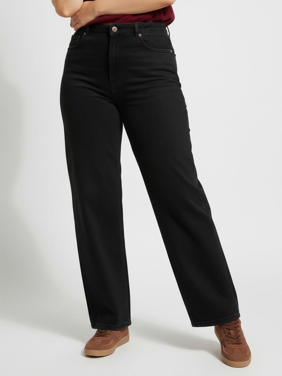 Jeansy wide leg z efektem sprania Plus size Jeansy wide leg z efektem sprania Plus size - czarny - SINSAY