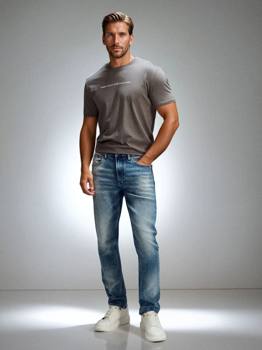 Jeansy slim fit z efektem sprania - niebieski - SINSAY