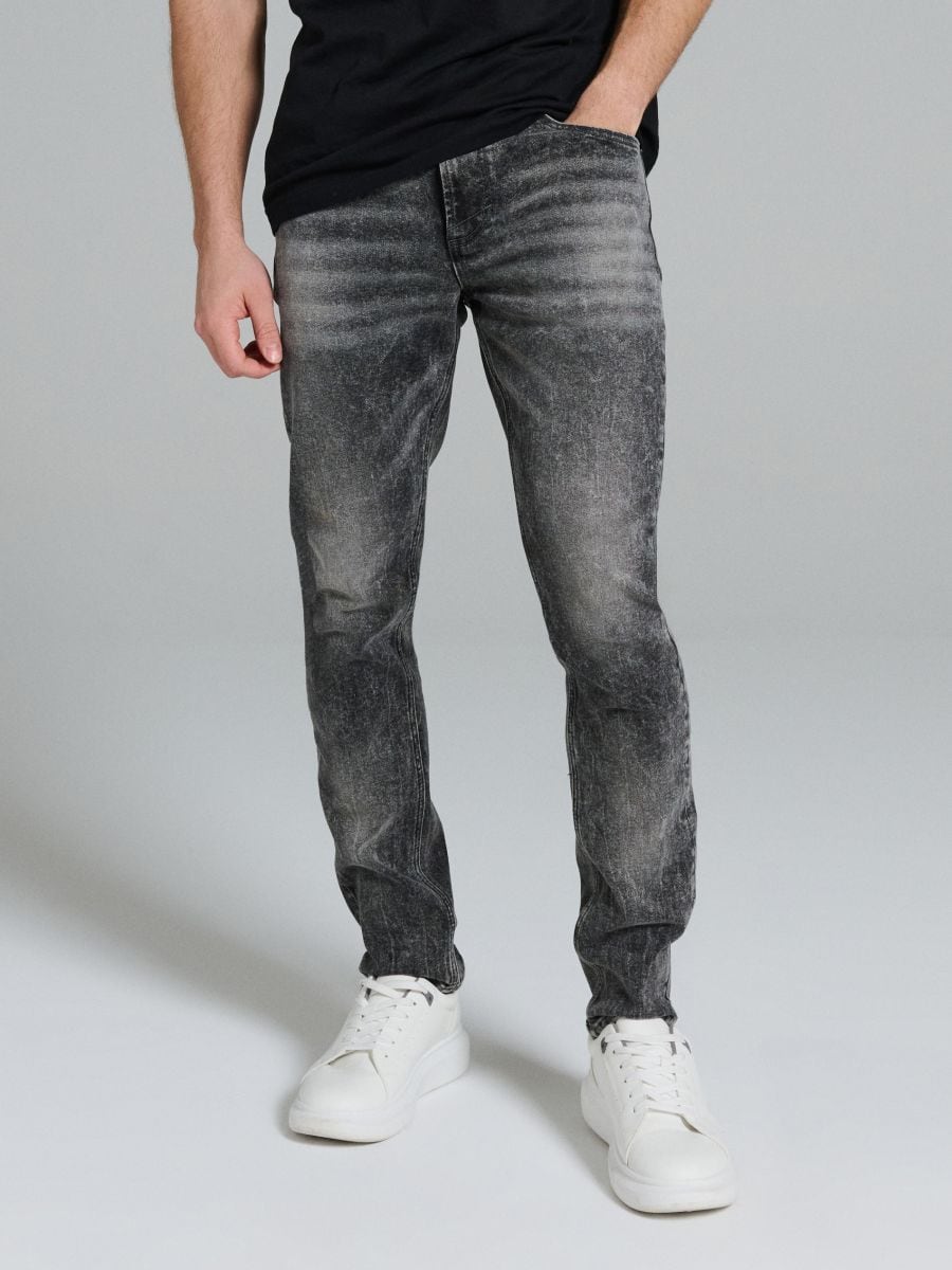 Jeansy slim fit z efektem sprania - szary - SINSAY