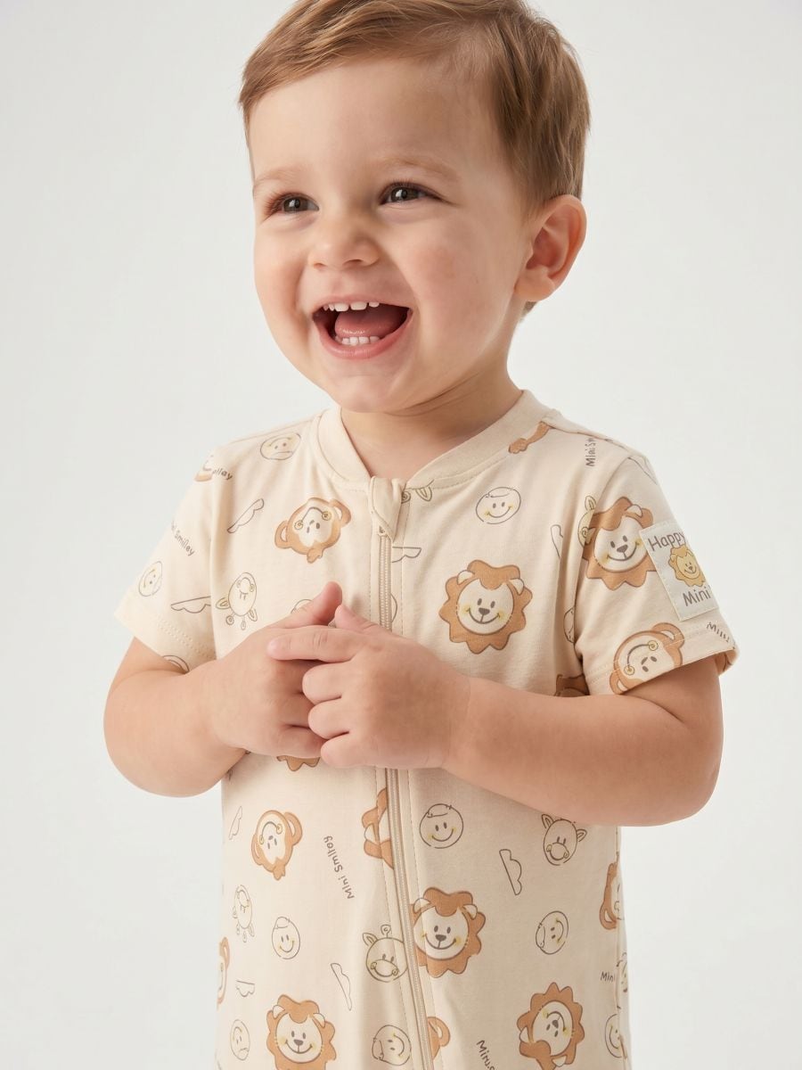 Bawełniany rampers z nadrukiem Mini Smiley® Bawełniany rampers z nadrukiem Mini Smiley® - beżowy - SINSAY