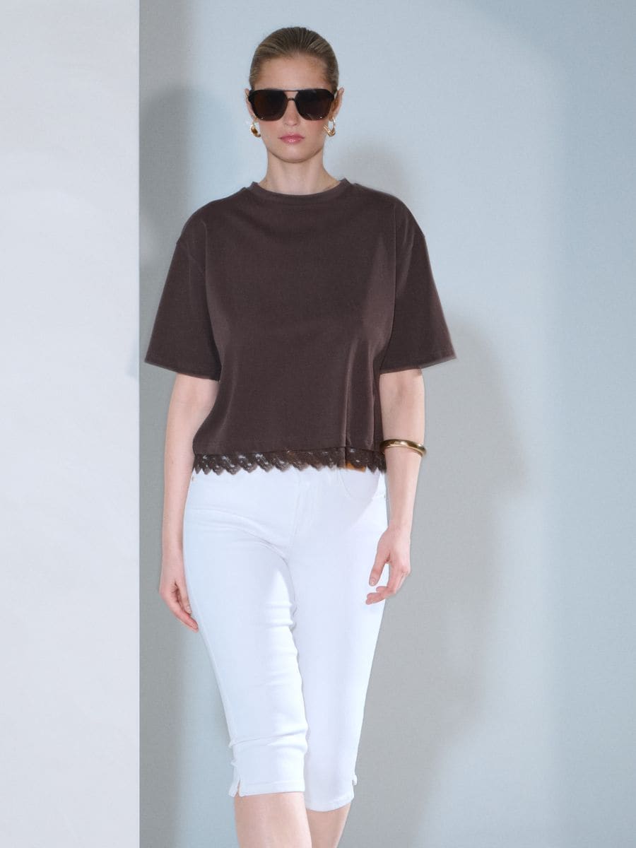 Jeansy capri z paskiem Jeansy capri z paskiem - kremowy - SINSAY