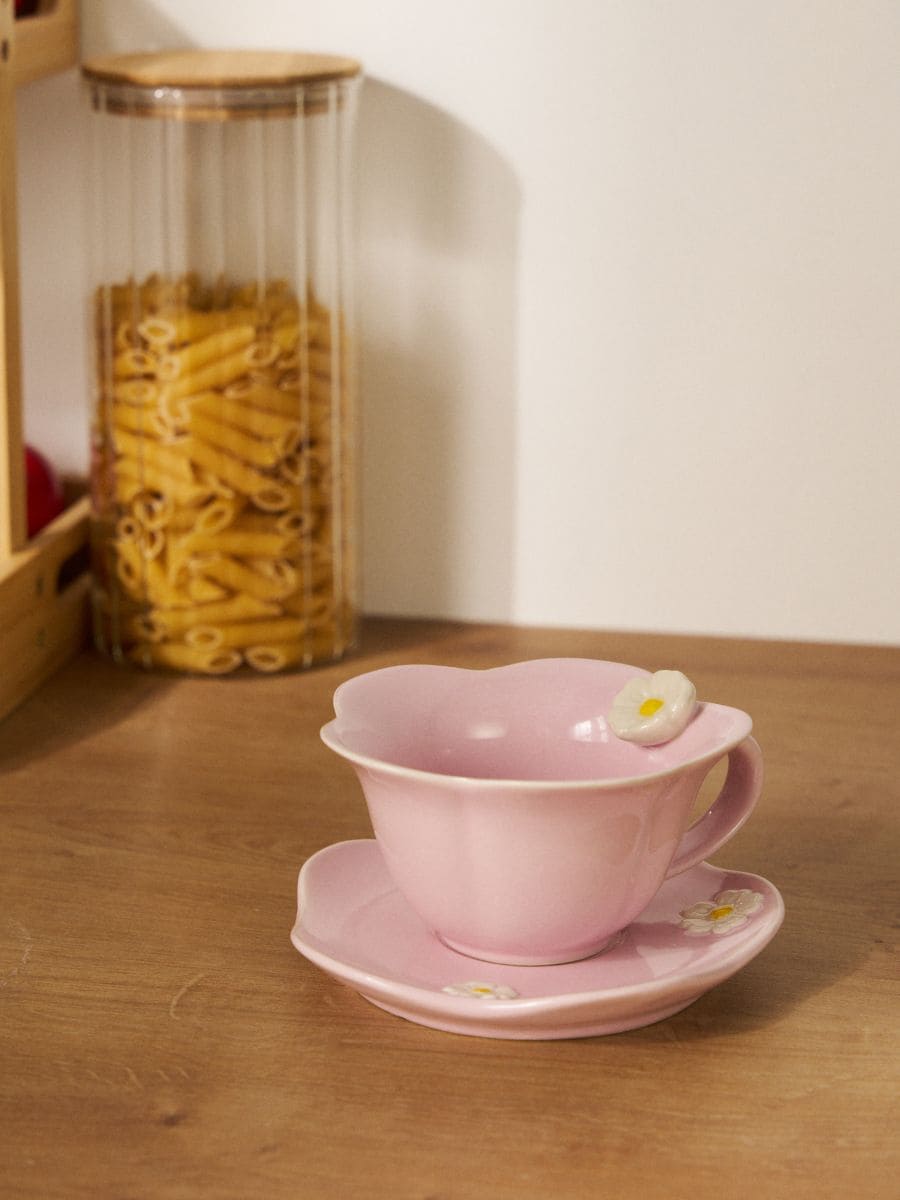 Ceramiczna filiżanka i spodek z motywem kwiatowym - różowy - SINSAY