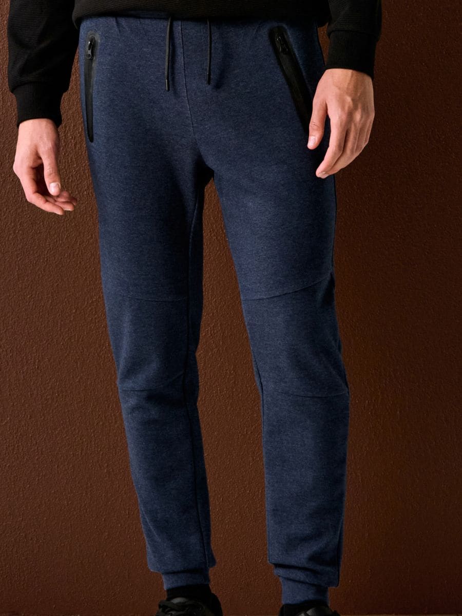 Spodnie dresowe jogger Spodnie dresowe jogger - granatowy - SINSAY