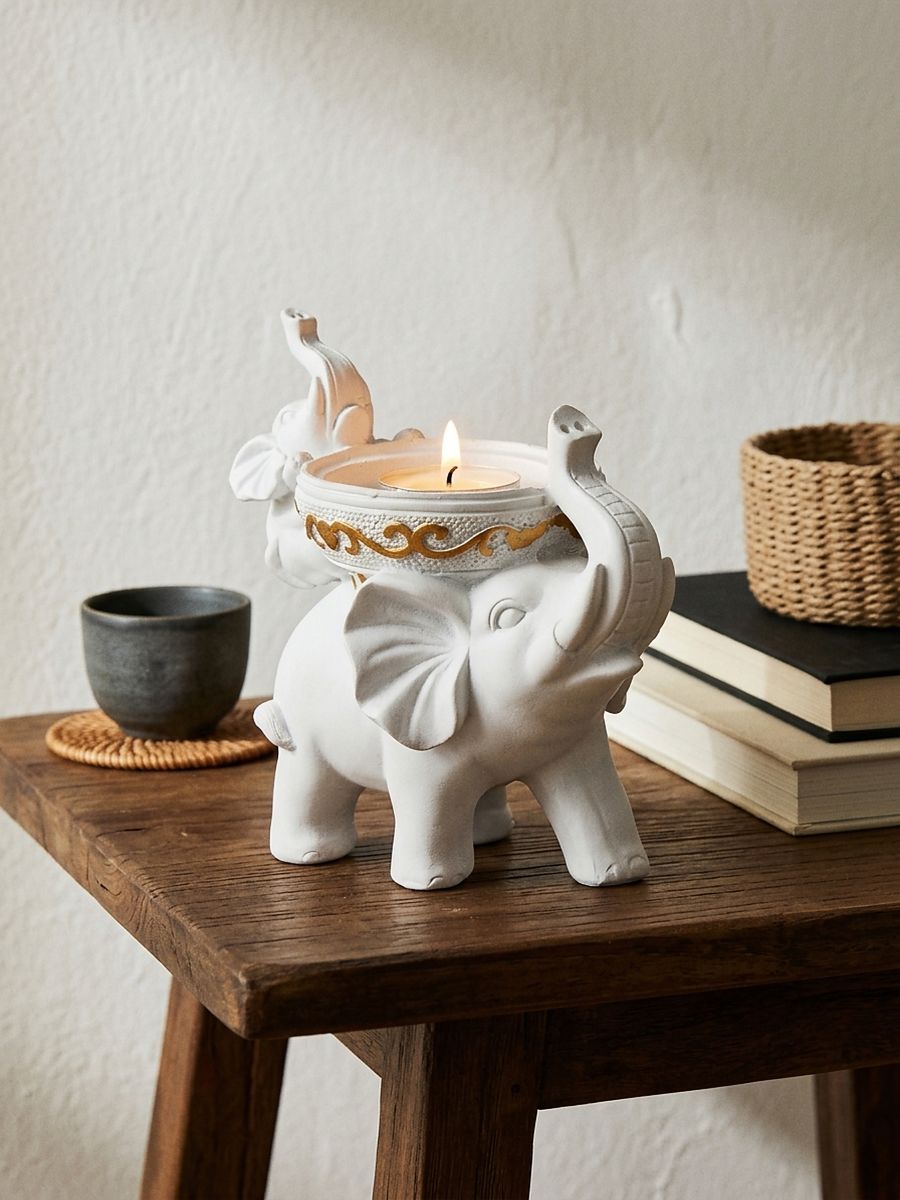 Świecznik na tealight w kształcie słonia Świecznik na tealight w kształcie słonia - biały - SINSAY