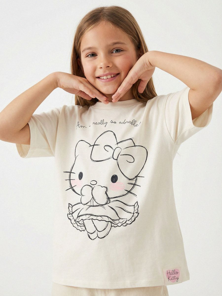 Bawełniana koszulka z nadrukiem Hello Kitty - kremowy - SINSAY